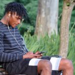 man, smartphone, relaxing, leisure, earphones, listening, watching, black man, black, young, bench, outdoors, earphones, earphones, listening, listening, listening, black man, black man, black man, black man, black man